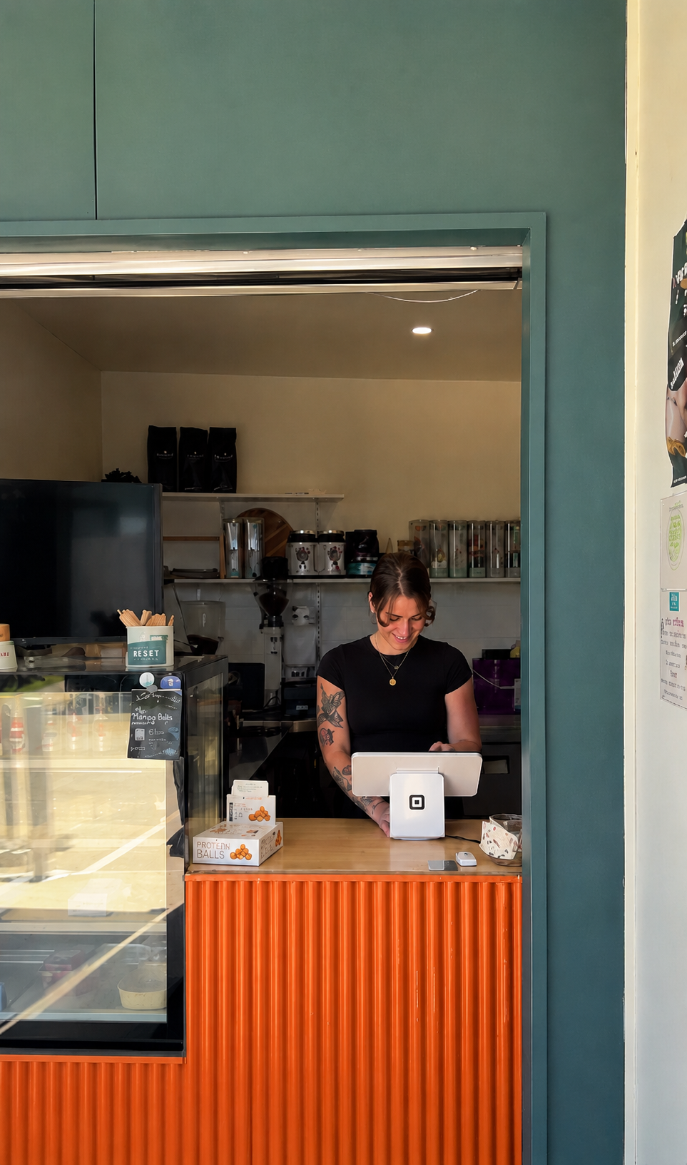 Barista at the Reset Sanctuary Cafe counter